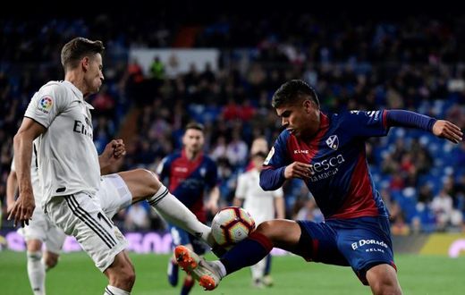 Spanish midfielder Marcos Llorente (left) has agreed a transfer from Real Madrid to Atletico.