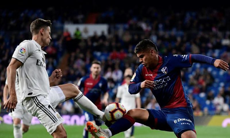 Spanish midfielder Marcos Llorente (left) has agreed a transfer from Real Madrid to Atletico.