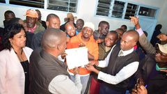 Imran Okoth receiving the ODM nomination certificate
