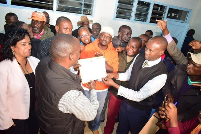 Imran Okoth receiving the ODM nomination certificate