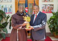 President Uhuru Kenyatta with teacher Peter Tabichi