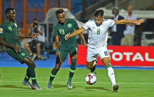 Tokyo Olympic Games hopeful Samuel Chukwueze (C) playing for Nigeria against Algeria in the Africa Cup of Nations semi-finals
