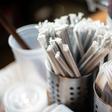 Plastic straws wrapped in paper are seen at a food hall in Washington on June 20, 2019, days before a ban on such straws is to take effect