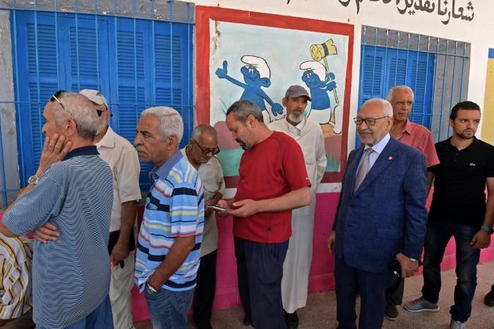 Polling stations were teeming with adult and elderly voters Sunday morning, but few young people had yet to make a showing