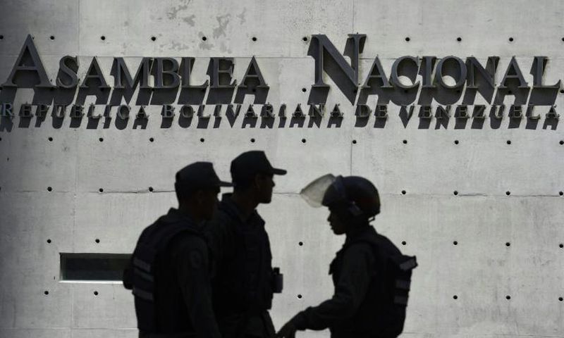 Members of Venezuela's Bolivarian National Guard outside the Federal Legislative Palace, which houses both the opposition-led National Assembly and the pro-government National Constituent Assembly, in Caracas on May 15, 2019