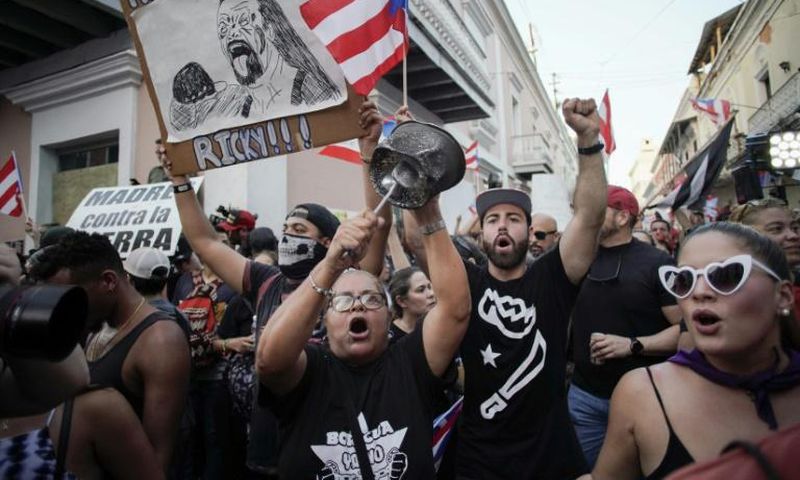 Demonstrators protest in front of the mansion of Puerto Rico's Governor, Ricardo Rossello, known as La Fortaleza, in San Juan, Puerto Rico, on July 24, 2019