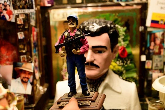 A figurine of Mexican drug lord Joaquin "El Chapo" Guzman, who is feared and revered in equal measure in Mexico's Sinaloa region