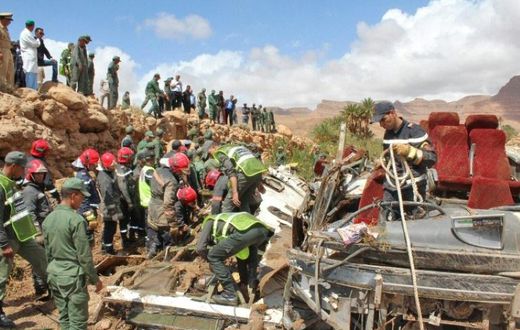 Moroccan rescuers search for bodies after floods overturned a bus on September 8 in the kingdom's southeast