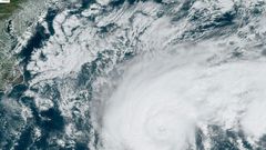Humberto moves off the US east coast in the Atlantic Ocean on September 18 in this satellite image obtained from NOAA/RAMMB
