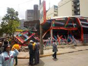 Bulldozer demolishes structures at the former Simmers Pub along Kenyatta Avenue, Nairobi (Twitter)