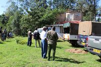 Police officers gathered outside the home of the Israeli man murdered in Trans Nzoia (Nation)