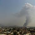 Smoke rises from the site of a September 3 attack in Kabul: US negotiations with the Taliban aim to reduce the level of violence in the country, but experts say they won't end the threat from groups lke Al-Qaeda and Islamic State