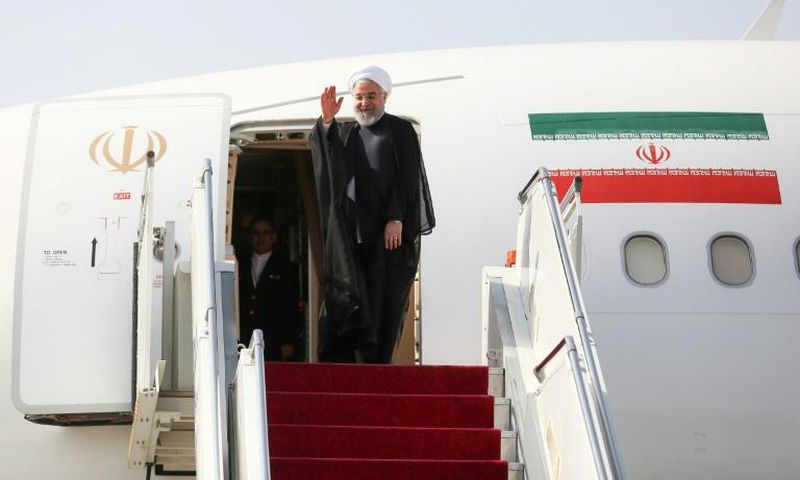 Iran's President Hassan Rouhani spoke to reporters at Mehrabad airport, en-route Monday for the UN General Assembly in New York