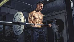 Grow Gigantic Arms Using This Hybrid Training Plan