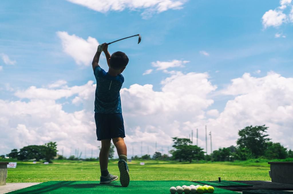 Actor Michael Pea Golfs with His 10-Year-Old Son