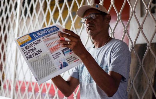 A man reads the last edition of 'El Nuevo Diario' newspaper in Managua on September 27, 2019