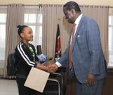 AU envoy Raila Odinga with Wendy Waeni at his office