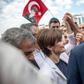 Canan Kaftancioglu, seen outside the court house, faces up to 17 years in prison for allegedly "insulting" President Erdogan on Twitter