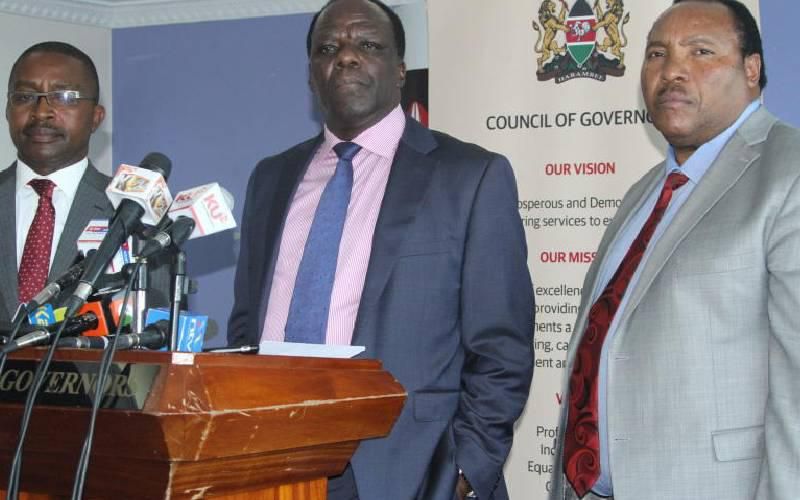 CoG Chair Wycliffe Oparanya accompanied by his deputy Mwangi Wa Iria and Kiambu Governor Ferdinand Waititu (Standard)