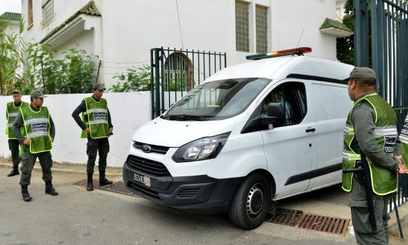 A van carrying suspects in the murder of two Scandinavian hikers enters the court house in Sale, Morocco on June 27, 2019