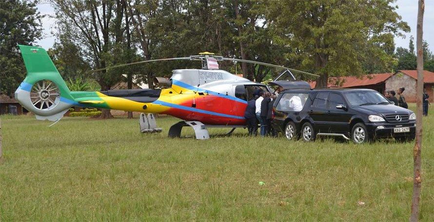 Chopper ferrying the body of Mastermind Tobacco tycoon Wilfred Murungi at Kiurani Primary School ahead of his burial