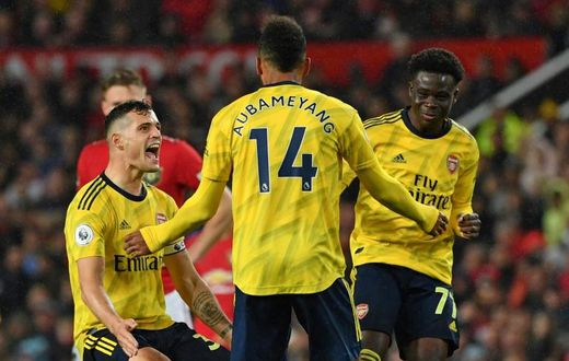 VAR to the rescue: Pierre-Emerick Aubameyang celebrates Arsenal's equaliser