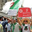 Algerian protesters on Friday braved a large police presence and called for civil disobedience for the first time since they began taking to the streets nearly six months ago