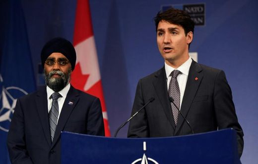 Canadian Prime Minister Justin Trudeau (R), flanked by his Minister of Defense Harjit Singh Sajjan (L) in 2017 -- Trudeau is a fervent advocate of Canadian multiculturalism