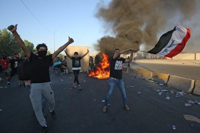 Iraqi authorities initially blamed "unidentified snipers" for protest deaths, but later acknowledged the military had used excessive force