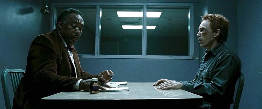 Kovac is interviewed by Long in Zack Snyders adaptation Watchmen (2009)
