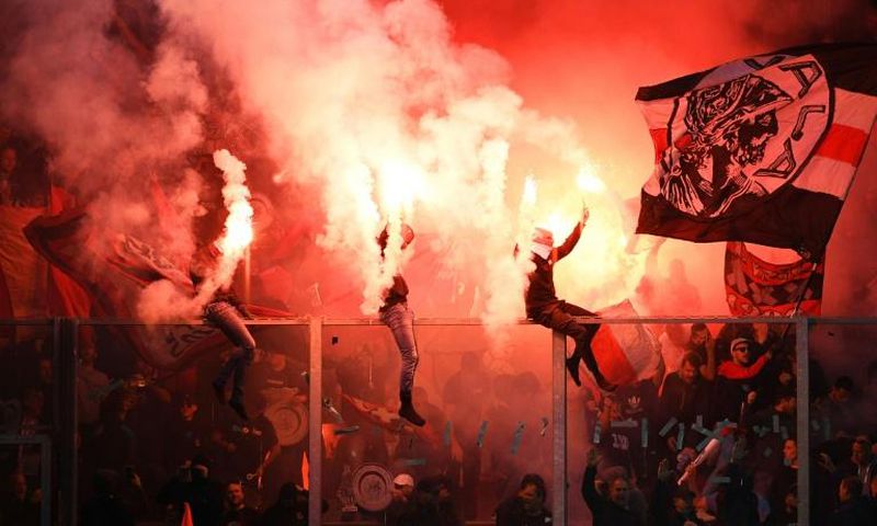 Ajax fans celebrate their team winning their 34th Dutch title on Wednesday