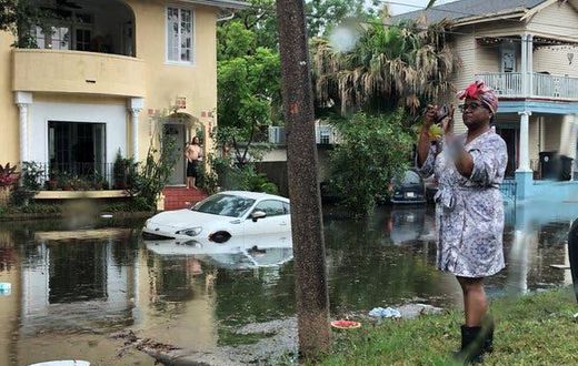 Storm, brimming with rain, barrels toward waterlogged Louisiana