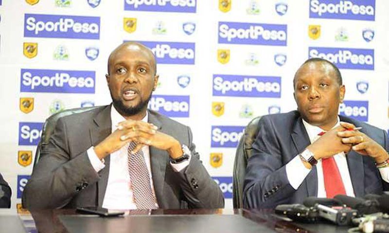 File image of SportPesa Chief Executive Officer Ronald Karauri (left) flanked by Kirimi Kaberia