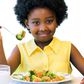 Little girl eating healthy