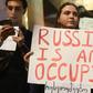 Protests erupted in Tbilisi after a Russian MP addressed parliament from the speaker's seat -- a controversial move in a country at loggerheads with Moscow
