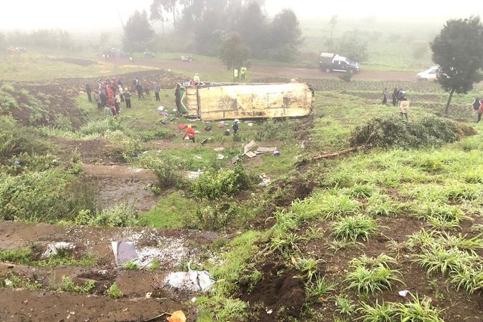 Mbukinya bus full of passengers rolls off the Kinungi black spo