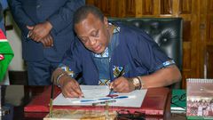 File image of President Uhuru Kenyatta. He has urged all public servants to wear at least one piece of apparel that is made in Kenya on Fridays