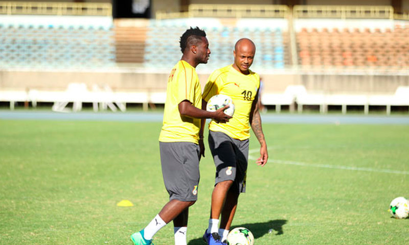 Asamoah Gyan and Andre Ayew