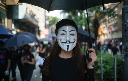 Online forums encouraged Hong Kong protesters to wear Guy Fawkes masks for the October 1 rallies