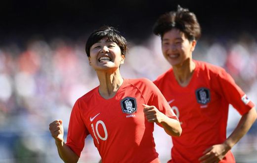 South Korea's Ji So-yun celebrates after scoring a goal against the United States during a exhibition contest at Soldier Field in Chicago