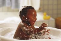 Baby in the tub(Chicago Citizens Newspaper)