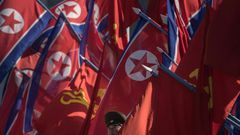 The launch came a day after the North said that Pyongyang had agreed to hold working-level talks with Washington later this week