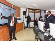 President Uhuru Kenyatta with workers at a KRA centre during a past visit