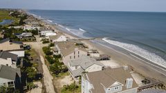 Rich Counties Get More Help to Escape Climate Risk, New Data Show