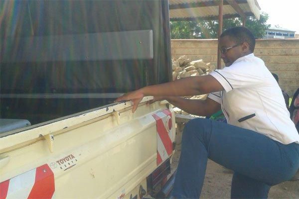 A nurse from Shalom Hospital boards a police vehicle before she recorded a statement on baby Ethan Muendo's death (Daily Nation)