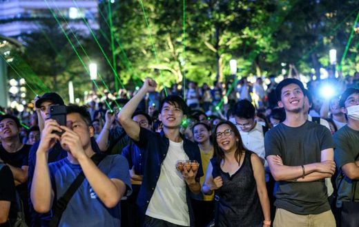 The protest coincided with a nightly laser and light show sponsored by the government