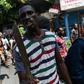 A demonstrator marches to demand the resignation of President Jovenel Moise, in Port-au-Prince, Haiti, on September 27, 2019