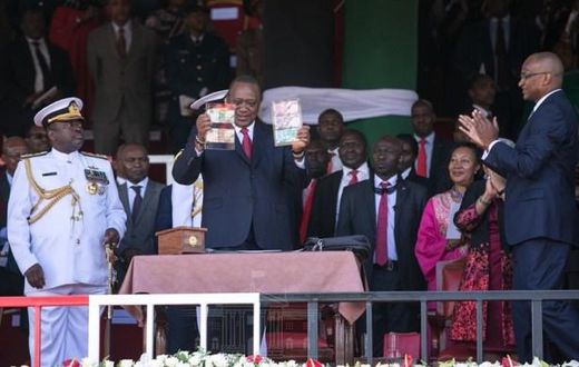 Preident Uhuru Kenyatta with CBK Governor Patrick Njoroge during the launch of new bank notes in Narok