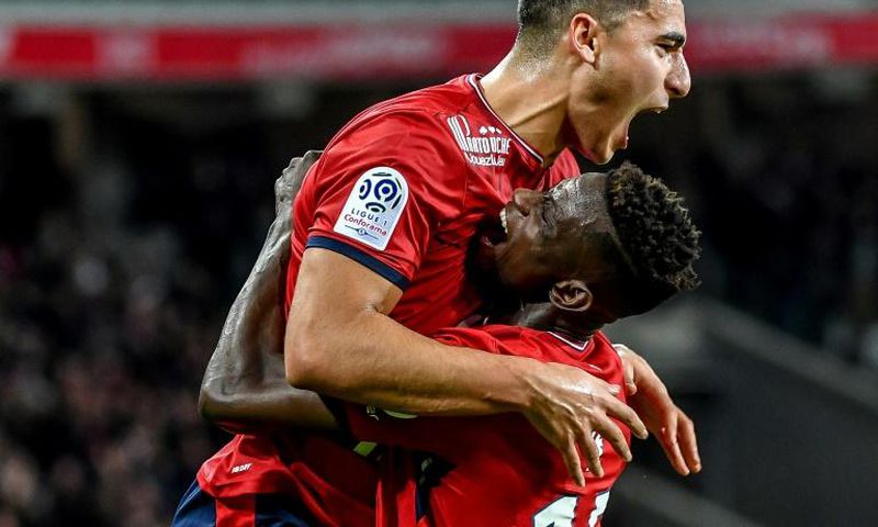 Netherlands international Anwar El Ghazi (left) has joined Premier League club Aston Villa on a permanent deal from Lille