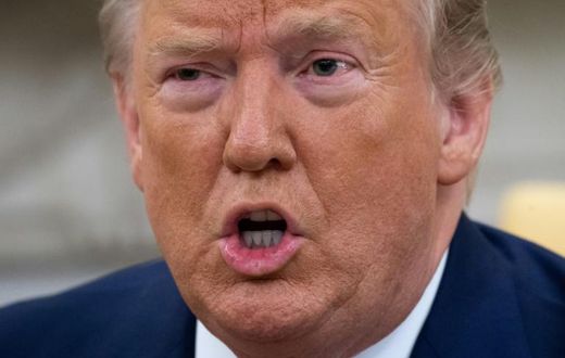 US President Donald Trump tells reporters in the Oval Office that he has imposed new sanctions on Iran's central bank
